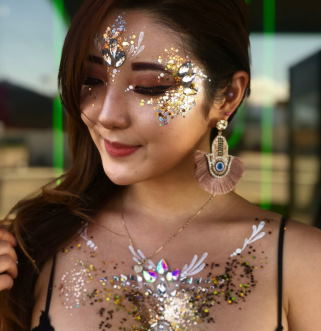 wearing glitter on face